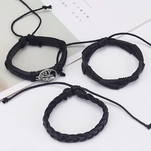 Three-piece set of black braided leather bracelets with tree of life charm and adjustable cord