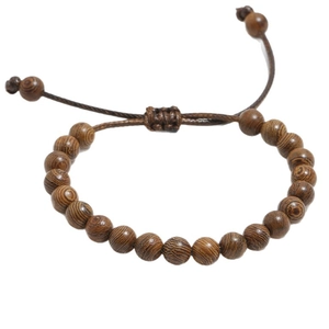 Adjustable brown wooden bead bracelet with textured wood grain and pull-string closure