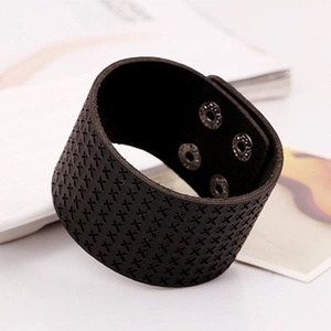Retro punk black leather bracelet with embossed cross patterns and adjustable metal snaps
