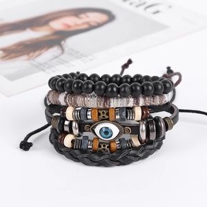 Bracelet multicouche style ethnique en cuir avec perles mauvais œil et cordons tressés