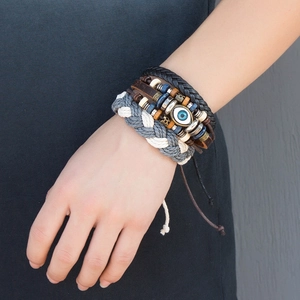 Multilayer men's leather bracelet set with woven cords and evil eye pendant charm