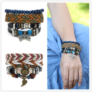 Multilayer bohemian woven leather bracelet set with butterfly and feather charms