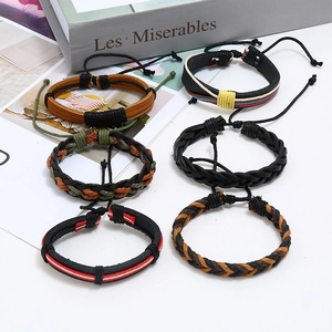 Detail view of a 6-piece vintage woven leather bracelet set with adjustable pull strings