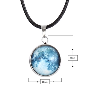 Detailed view of a 20mm round moon pendant with silver alloy base and black wax cord