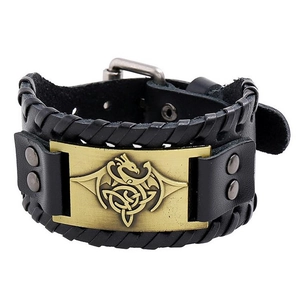 Vintage black leather cuff bracelet with bronze dragon emblem and celtic knot details