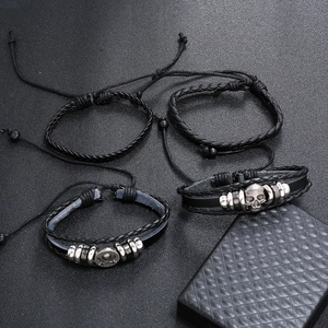 Men's retro skull beaded leather bracelet set with 4 pieces of woven and adjustable cord