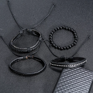 Men's retro black layered leather bracelet set with woven straps and beaded detail