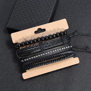 Set of four men's black multi-layer leather bracelets with beads and metal studs