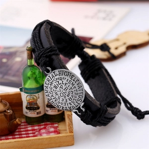 Retro multi-layer black braided leather bracelet with a vintage metal cross charm pendant