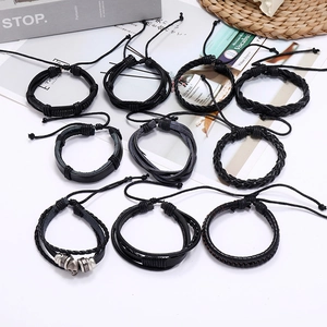 10-piece men's vintage black leather bracelet set with woven straps and skull charms