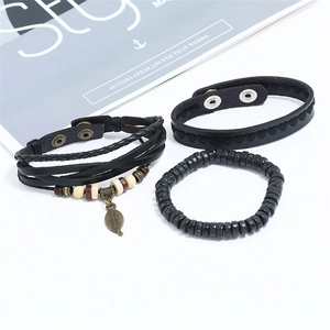 Three-piece vintage black braided leather bracelet set with wooden beads and leaf charm