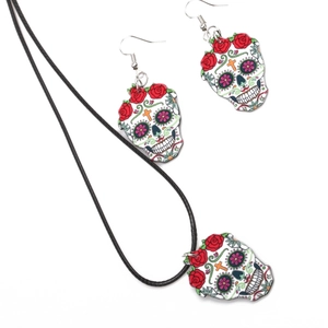 Detail of Halloween acrylic sugar skull jewelry set with red rose floral accents
