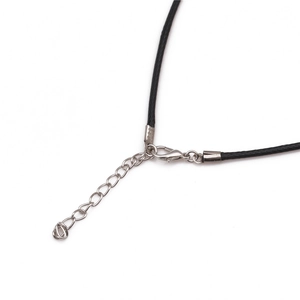 Detail of black wax cord necklace with silver lobster clasp and extension chain