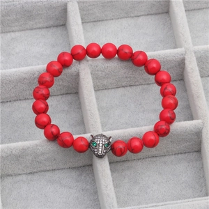 Beaded bracelet with 8mm red marble stones and micro-pave zircon leopard head charm
