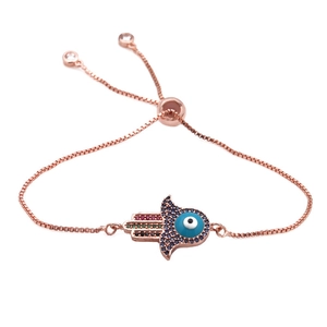 Bracelet main de Fatma en or rose avec œil bleu et pierres de zircon colorées