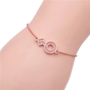 Rose gold adjustable bolo bracelet featuring a male symbol charm with pavé zircons