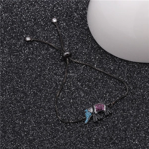 Detail of elephant adjustable bracelet with colorful cubic zirconia in black gunmetal finish