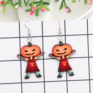 Whimsical Halloween pumpkin boy earrings with colorful acrylic pendants on display