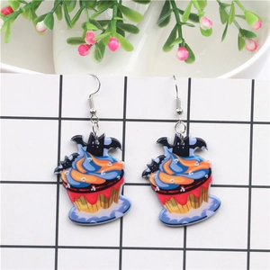 Close-up of Halloween cupcake earrings with black bat topper and colorful cream layers