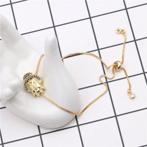 Golden micro-pave zircon Buddha head bracelet with adjustable box chain and charms