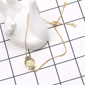 Adjustable gold Buddha head bracelet with micro-pave black zircon on box chain