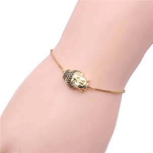 Micro-pave black zircon Buddha head bracelet in gold box chain for elegant women