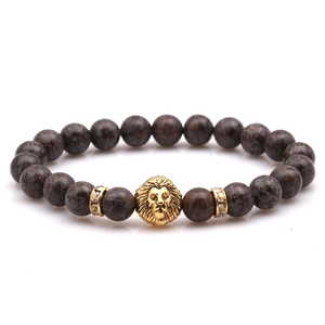 Mens natural brown stone bead bracelet featuring a golden lion head and crystal spacers