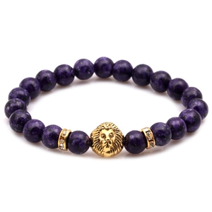 Purple volcanic stone beaded bracelet featuring a detailed golden lion head ornament