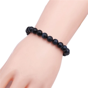 Minimalist 8mm deep blue tiger eye beaded bracelet featuring natural stone texture