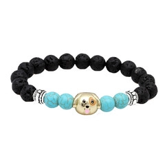 Vue détaillée du bracelet élastique en pierre de lave avec pendentif tête de chien