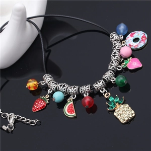Colorful beaded fruit necklace with strawberry watermelon pendants on black cord