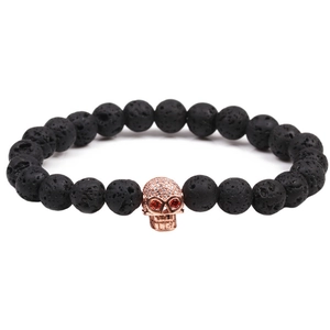 Lava stone skull bracelet featuring rose gold plated charm and micro-pave cubic zirconia