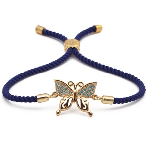 Adjustable blue braided rope bracelet with golden zircon butterfly charm and slide clasp