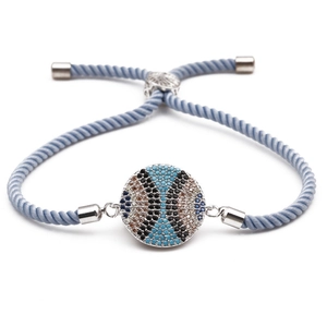 Adjustable copper baseball evil eye bracelet with micro-paved blue zircons and blue cord