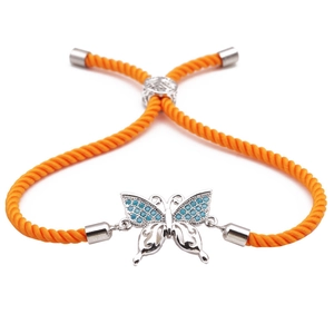 Adjustable orange braided rope bracelet featuring a silver butterfly pendant with blue zircon