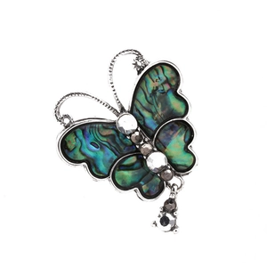 Elegant silver butterfly brooch featuring iridescent abalone shell wings and sparkling crystals