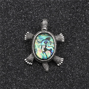 Retro turtle brooch with iridescent abalone shell inlay and silver alloy texture