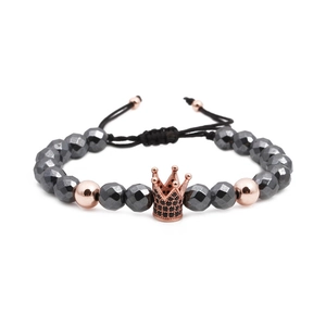 Faceted hematite beaded bracelet with rose gold crown charm and adjustable cord