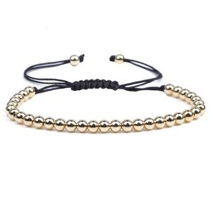 Minimalist adjustable woven bracelet with 4mm polished gold beads on black cord