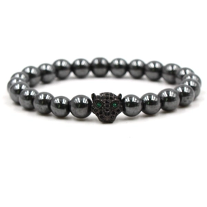 Handmade hematite beaded bracelet featuring a black copper leopard head with green zircon eyes