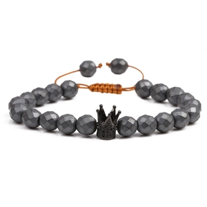 Faceted black stone beaded bracelet featuring a micro-paved black crown with adjustable cord