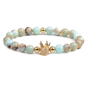Unisex imperial stone beaded bracelet with a gold crown charm and zircon inlay