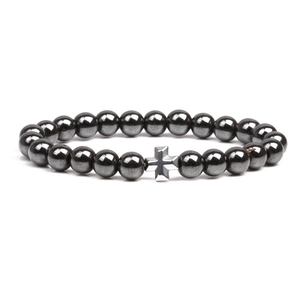 Men's 8mm magnetic hematite beaded bracelet with a silver cross accent on white background