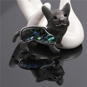 Artistic dog brooch with abalone shell inlay and textured silver black metal finish