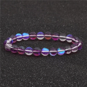 Bracelet en perles de pierre de lune arc-en-ciel avec effet oeil de chat bleu et violet