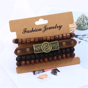 Retro multi-layer leather bracelet set with Yin Yang charm and wooden beads on card