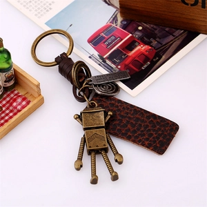 Handmade leather braided car keychain featuring a vintage bronze robot and alloy charms