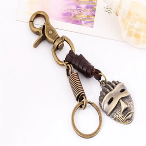 Vintage Herren Schlüsselanhänger mit Lederband und Bronzeanhänger im Tribal-Masken-Stil