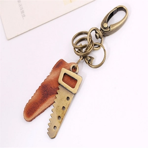 Retro punk bronze saw keychain with dark brown leather pendant and lobster clasp for bags
