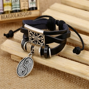 Handmade multilayer braided black leather bracelet featuring a Tai Chi Yin Yang pendant